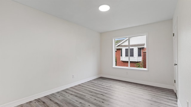 24006 Scrivener Ln, Katy, TX 77493 - spare room with light wood-style flooring and baseboards