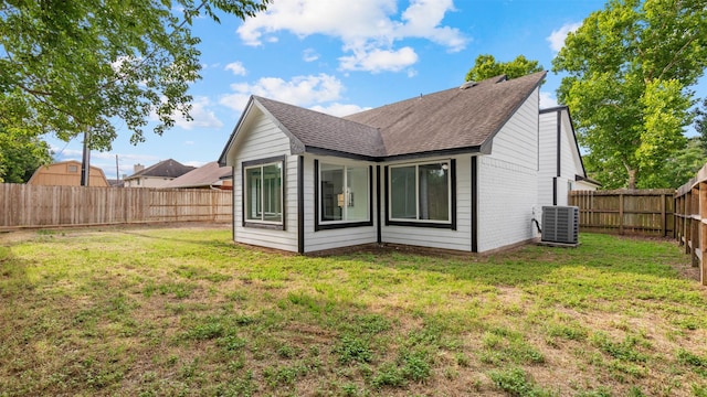 24006 Scrivener Ln, Katy, TX 77493 - rear view of property with a shingled roof and central AC