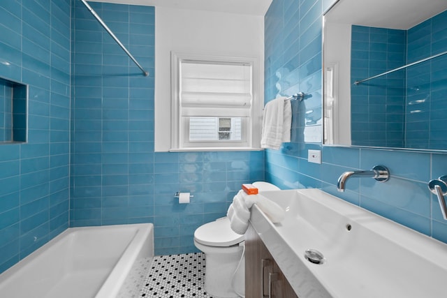 2101 Banks St, Houston, TX 77098 - full bathroom with vanity, toilet, tile walls, tile patterned floors, and tub / shower combination