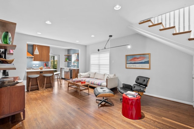 2101 Banks St, Houston, TX 77098 - living area with light wood-type flooring, recessed lighting, and baseboards