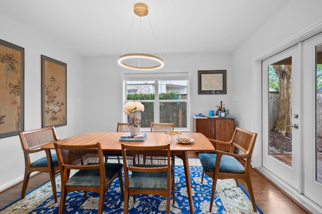 2101 Banks St, Houston, TX 77098 - dining space with plenty of natural light and wood finished floors