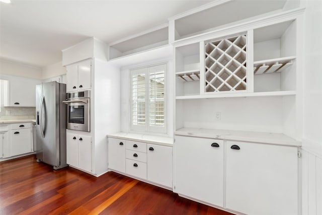 9643 Meadowcroft Dr, Houston, TX 77063 - kitchen featuring stainless steel appliances, open shelves, dark wood finished floors, and white cabinetry
