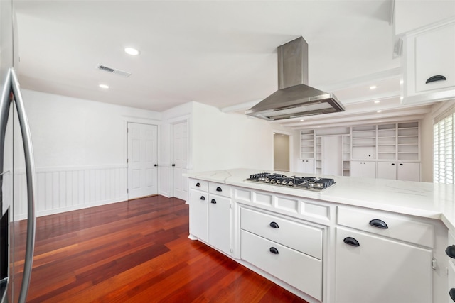 9643 Meadowcroft Dr, Houston, TX 77063 - kitchen with extractor fan, appliances with stainless steel finishes, dark wood-type flooring, white cabinetry, and light stone countertops