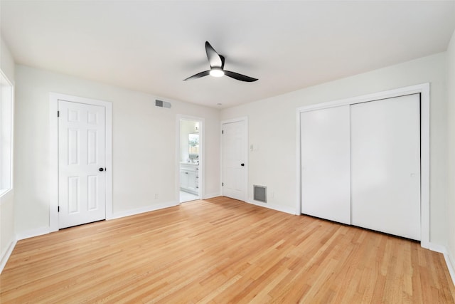 9643 Meadowcroft Dr, Houston, TX 77063 - unfurnished bedroom with light wood finished floors, baseboards, ensuite bath, and ceiling fan