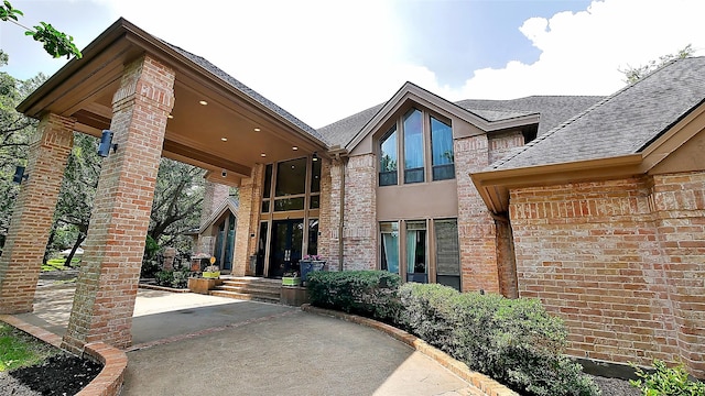 19823 Sunbridge Ln, Houston, TX 77094 - entrance to property with brick siding and a shingled roof