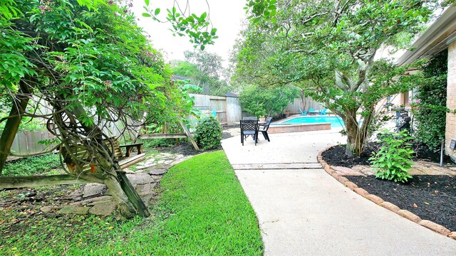 19823 Sunbridge Ln, Houston, TX 77094 - fenced backyard featuring a patio area