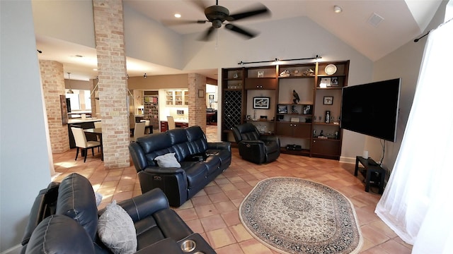 19823 Sunbridge Ln, Houston, TX 77094 - living area featuring decorative columns, ceiling fan, light tile patterned floors, high vaulted ceiling, and recessed lighting
