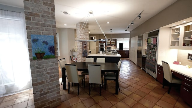 19823 Sunbridge Ln, Houston, TX 77094 - dining space featuring wine cooler and tile patterned flooring