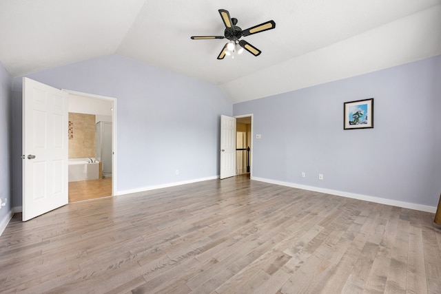 17823 Scenic Oaks Dr, Richmond, TX 77407 - unfurnished bedroom featuring vaulted ceiling, light wood-style flooring, baseboards, and ceiling fan