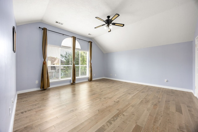 17823 Scenic Oaks Dr, Richmond, TX 77407 - bonus room featuring vaulted ceiling, wood finished floors, ceiling fan, and baseboards