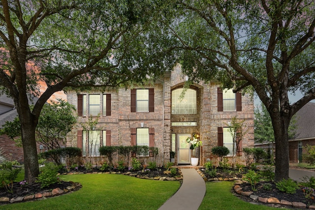 18614 Spring Heather Ct, Spring, TX 77379 - view of front facade with a front yard and brick siding