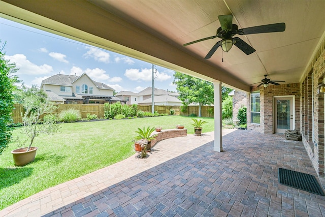 7319 Fair Meadow Ln, Katy, TX 77494 - view of patio featuring a ceiling fan and a residential view
