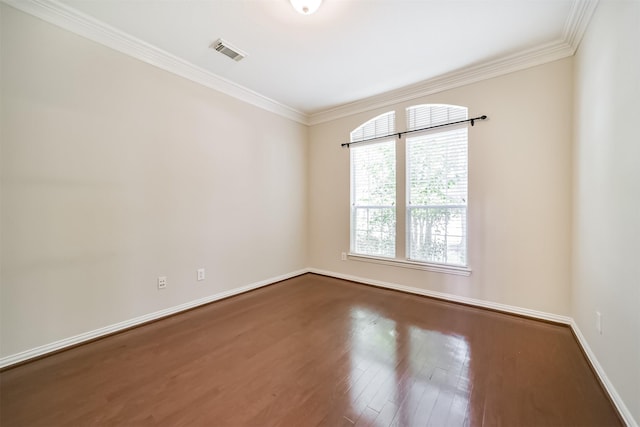 7319 Fair Meadow Ln, Katy, TX 77494 - unfurnished room featuring dark wood finished floors, ornamental molding, and baseboards