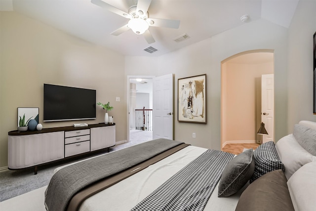 7319 Fair Meadow Ln, Katy, TX 77494 - carpeted bedroom with arched walkways, ceiling fan, and baseboards