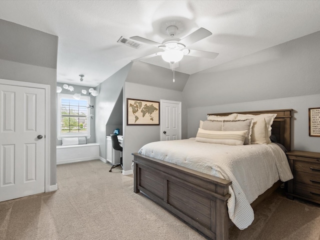 9810 Clubhouse Cir, Magnolia, TX 77354 - bedroom with light colored carpet, baseboards, ceiling fan, and vaulted ceiling