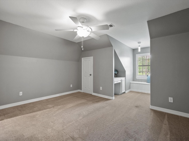 9810 Clubhouse Cir, Magnolia, TX 77354 - bonus room with carpet flooring, a ceiling fan, lofted ceiling, and baseboards