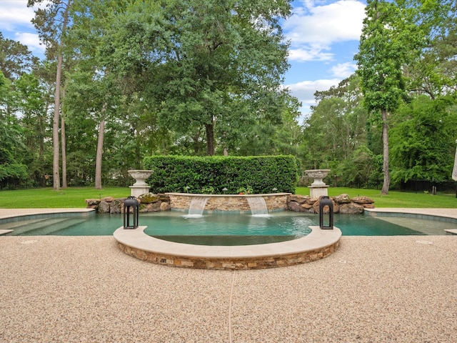 9810 Clubhouse Cir, Magnolia, TX 77354 - view of swimming pool with a lawn and view of wooded area