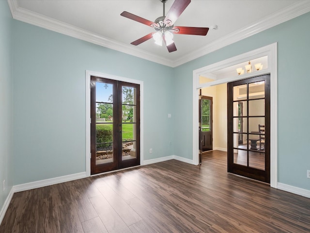 9810 Clubhouse Cir, Magnolia, TX 77354 - empty room featuring french doors, crown molding, dark wood-style flooring, baseboards, and ceiling fan