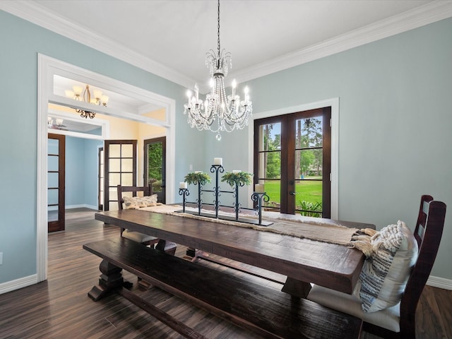 9810 Clubhouse Cir, Magnolia, TX 77354 - dining space featuring french doors, a chandelier, ornamental molding, and baseboards
