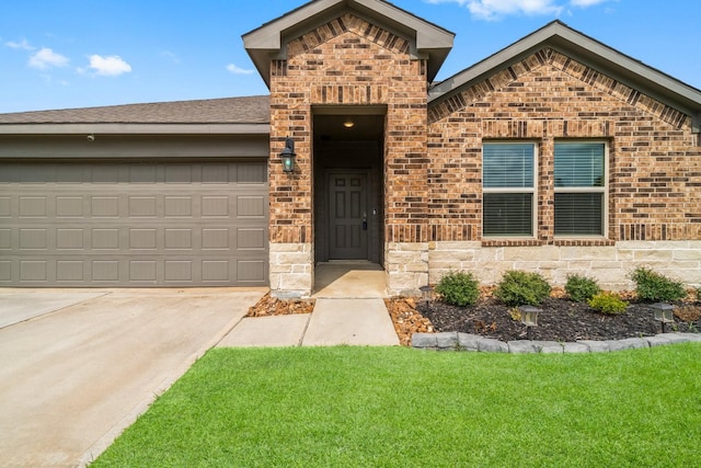 3713 Shady Elk Ct, Conroe, TX 77301 - view of front of property featuring driveway, brick siding, stone siding, and a garage