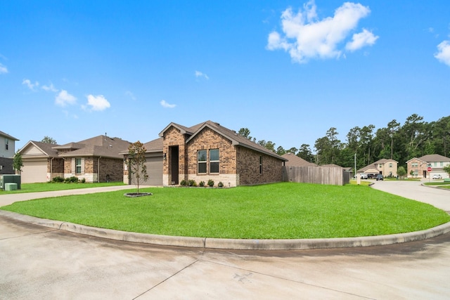 3713 Shady Elk Ct, Conroe, TX 77301 - view of front of home with brick siding, concrete driveway, and an attached garage