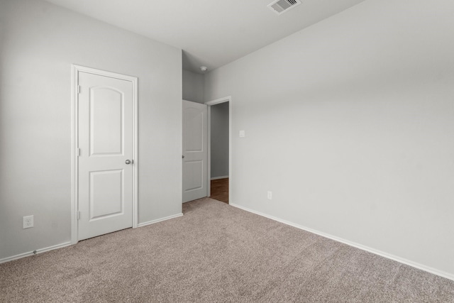 3713 Shady Elk Ct, Conroe, TX 77301 - unfurnished bedroom featuring carpet and baseboards