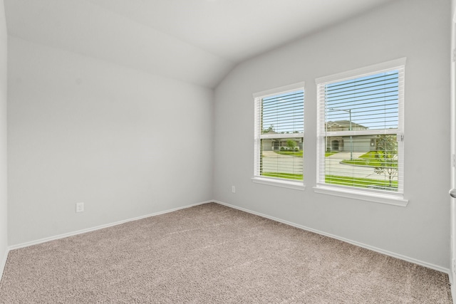 3713 Shady Elk Ct, Conroe, TX 77301 - carpeted empty room with baseboards and vaulted ceiling