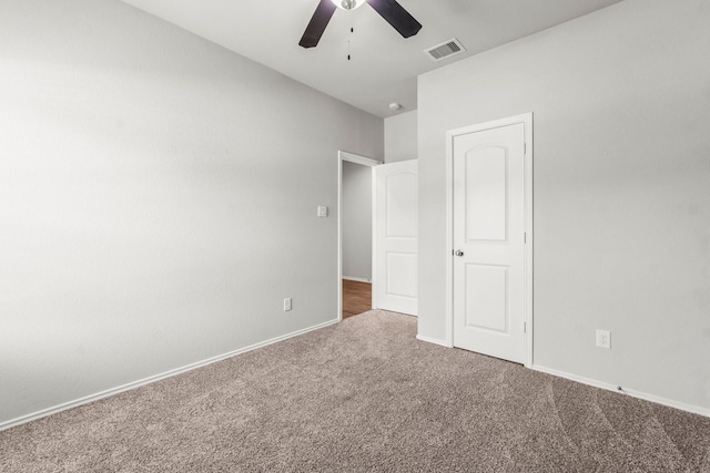 3713 Shady Elk Ct, Conroe, TX 77301 - unfurnished bedroom featuring carpet flooring, baseboards, and a ceiling fan