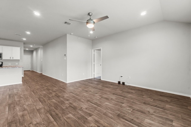 3713 Shady Elk Ct, Conroe, TX 77301 - unfurnished living room with recessed lighting, a ceiling fan, dark wood-style flooring, baseboards, and lofted ceiling