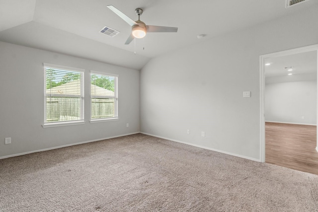3713 Shady Elk Ct, Conroe, TX 77301 - spare room featuring carpet floors, a ceiling fan, lofted ceiling, and baseboards