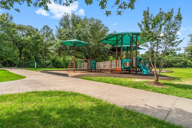 3713 Shady Elk Ct, Conroe, TX 77301 - community jungle gym with a yard and view of scattered trees