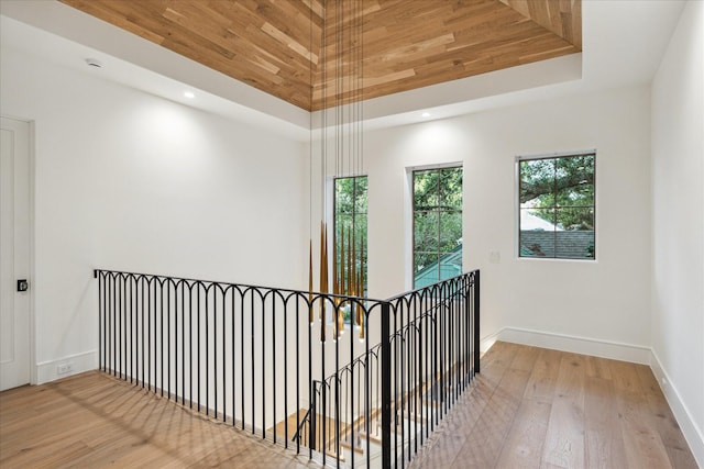 3755 Rice Blvd, Houston, TX 77005 - corridor featuring wood finished floors, an upstairs landing, a towering ceiling, baseboards, and recessed lighting