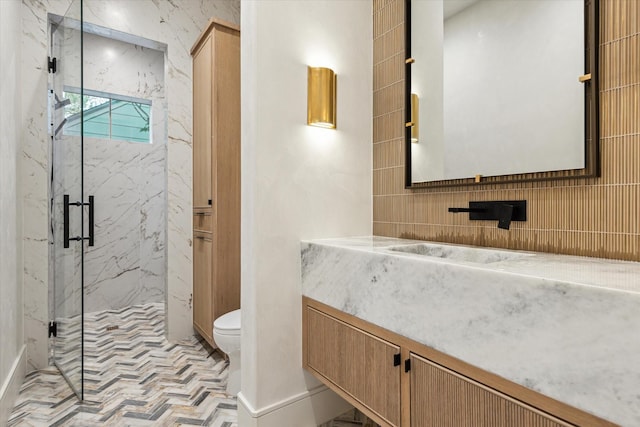 3755 Rice Blvd, Houston, TX 77005 - bathroom featuring toilet, a marble finish shower, and vanity