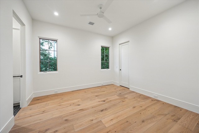 3755 Rice Blvd, Houston, TX 77005 - spare room with a ceiling fan, light wood-style floors, recessed lighting, and baseboards
