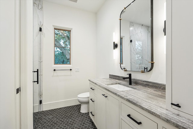 3755 Rice Blvd, Houston, TX 77005 - bathroom featuring a marble finish shower, vanity, toilet, and baseboards