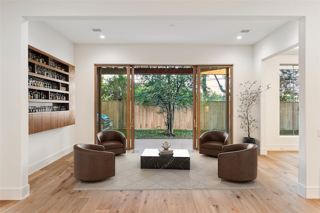 3755 Rice Blvd, Houston, TX 77005 - sitting room with wood finished floors, plenty of natural light, baseboards, and recessed lighting