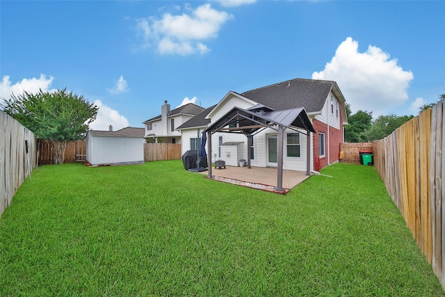 12010 Piney Bend Dr, Tomball, TX 77375 - back of property featuring a patio area, a shingled roof, and a gazebo