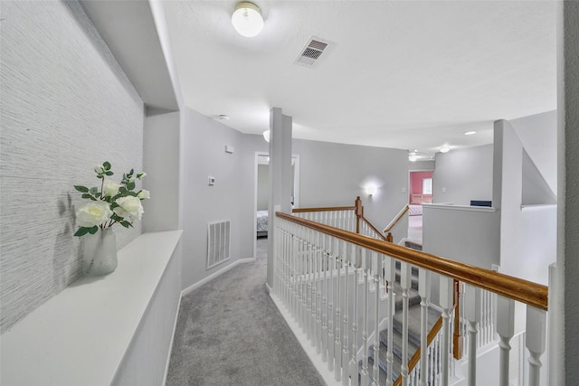 12010 Piney Bend Dr, Tomball, TX 77375 - corridor with an upstairs landing, carpet floors, and baseboards