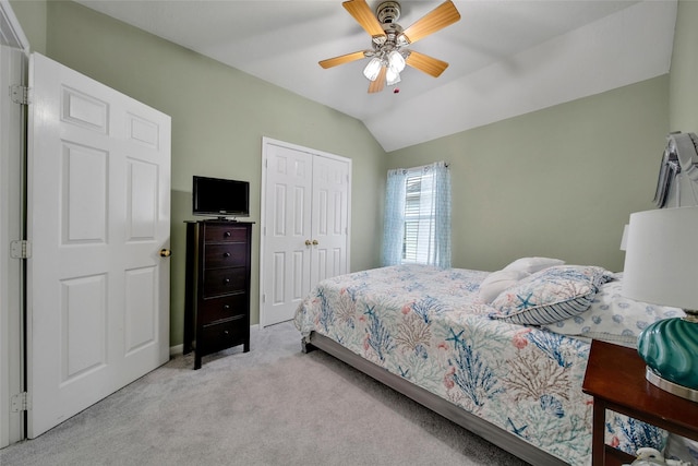 12010 Piney Bend Dr, Tomball, TX 77375 - bedroom with light colored carpet, a closet, lofted ceiling, and ceiling fan