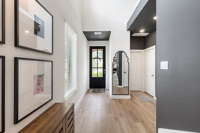 221 Sky Top Dr, Montgomery, TX 77316 - entryway with light wood-style flooring and baseboards