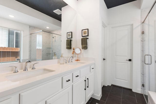 221 Sky Top Dr, Montgomery, TX 77316 - bathroom featuring a shower stall, tile patterned floors, double vanity, and recessed lighting