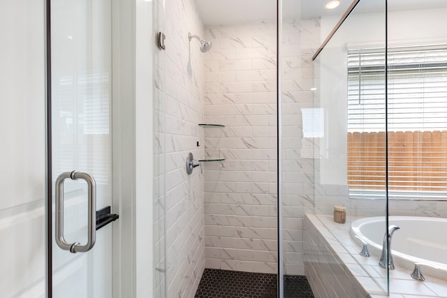 221 Sky Top Dr, Montgomery, TX 77316 - full bathroom with a stall shower, a garden tub, and tile patterned floors