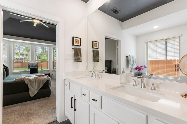 221 Sky Top Dr, Montgomery, TX 77316 - ensuite bathroom featuring double vanity, ceiling fan, and recessed lighting