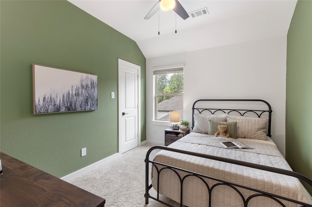 221 Sky Top Dr, Montgomery, TX 77316 - carpeted bedroom featuring baseboards, lofted ceiling, and a ceiling fan