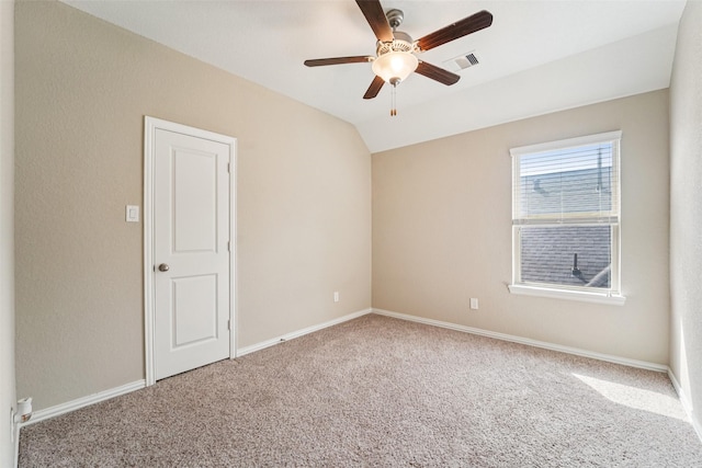 129 S Bearkat Ct, Montgomery, TX 77316 - carpeted spare room featuring a ceiling fan, vaulted ceiling, and baseboards