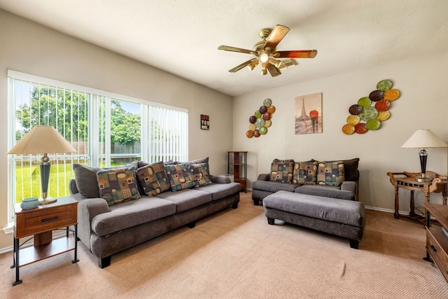 4907 Sienna Heights Ln, Pasadena, TX 77505 - living room featuring ceiling fan, carpet, and baseboards