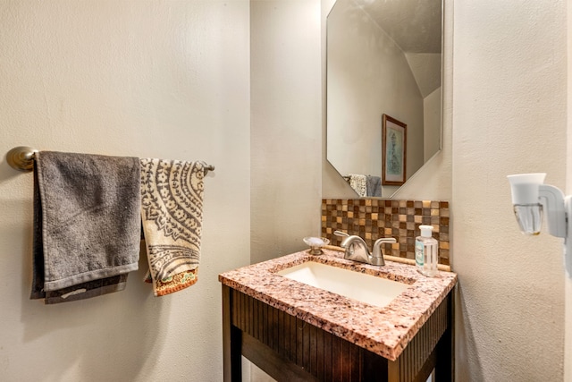 4907 Sienna Heights Ln, Pasadena, TX 77505 - bathroom with vanity and tasteful backsplash