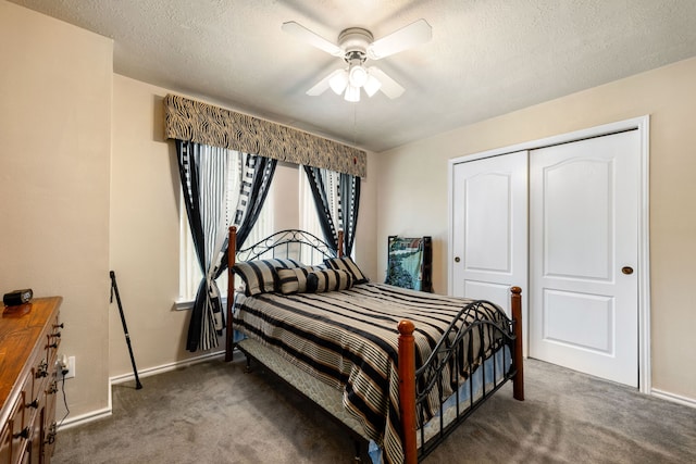 4907 Sienna Heights Ln, Pasadena, TX 77505 - bedroom with carpet flooring, baseboards, a textured ceiling, and a closet