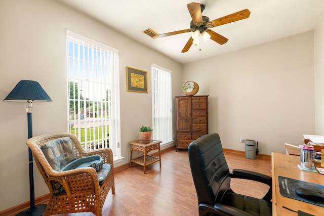 4907 Sienna Heights Ln, Pasadena, TX 77505 - home office featuring wood finished floors, ceiling fan, and baseboards