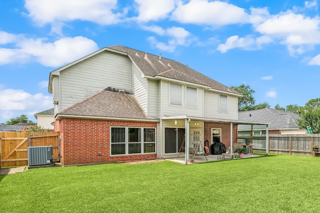 4907 Sienna Heights Ln, Pasadena, TX 77505 - back of house with central air condition unit, roof with shingles, a patio, and brick siding